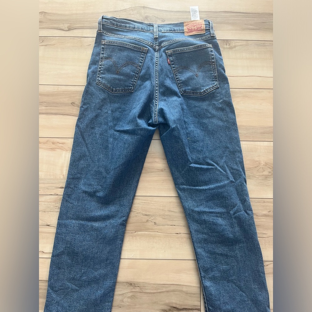Levi’s wedgie straight button fly jeans